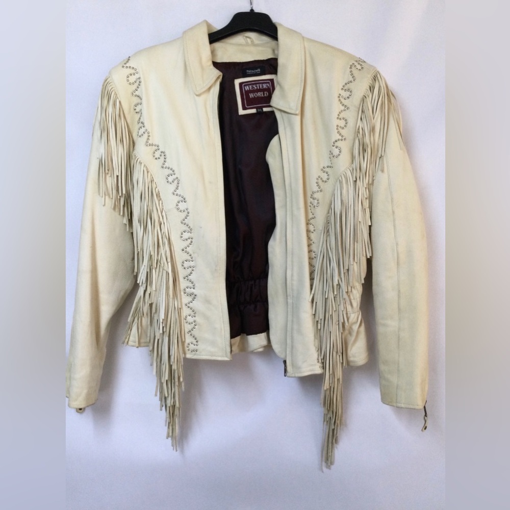 Lamb skin Fringe Jacket and chaps.